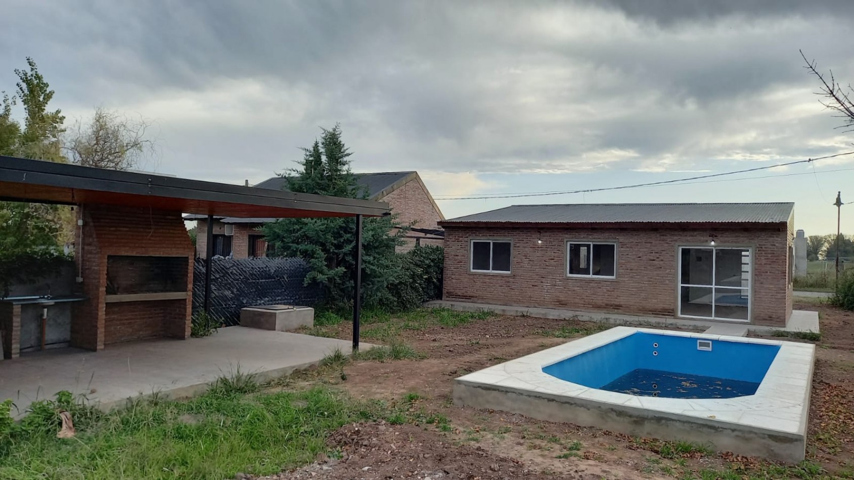 Casa 3 Dormitorios con Piscina Las Tardes Roldan Acepta Permuta